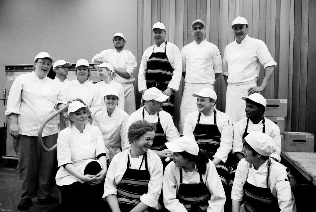 The White Tie Catering team captured in the kitchen.